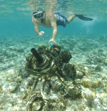 Patrick Ranfranz reviewing wreckage on Yap Island